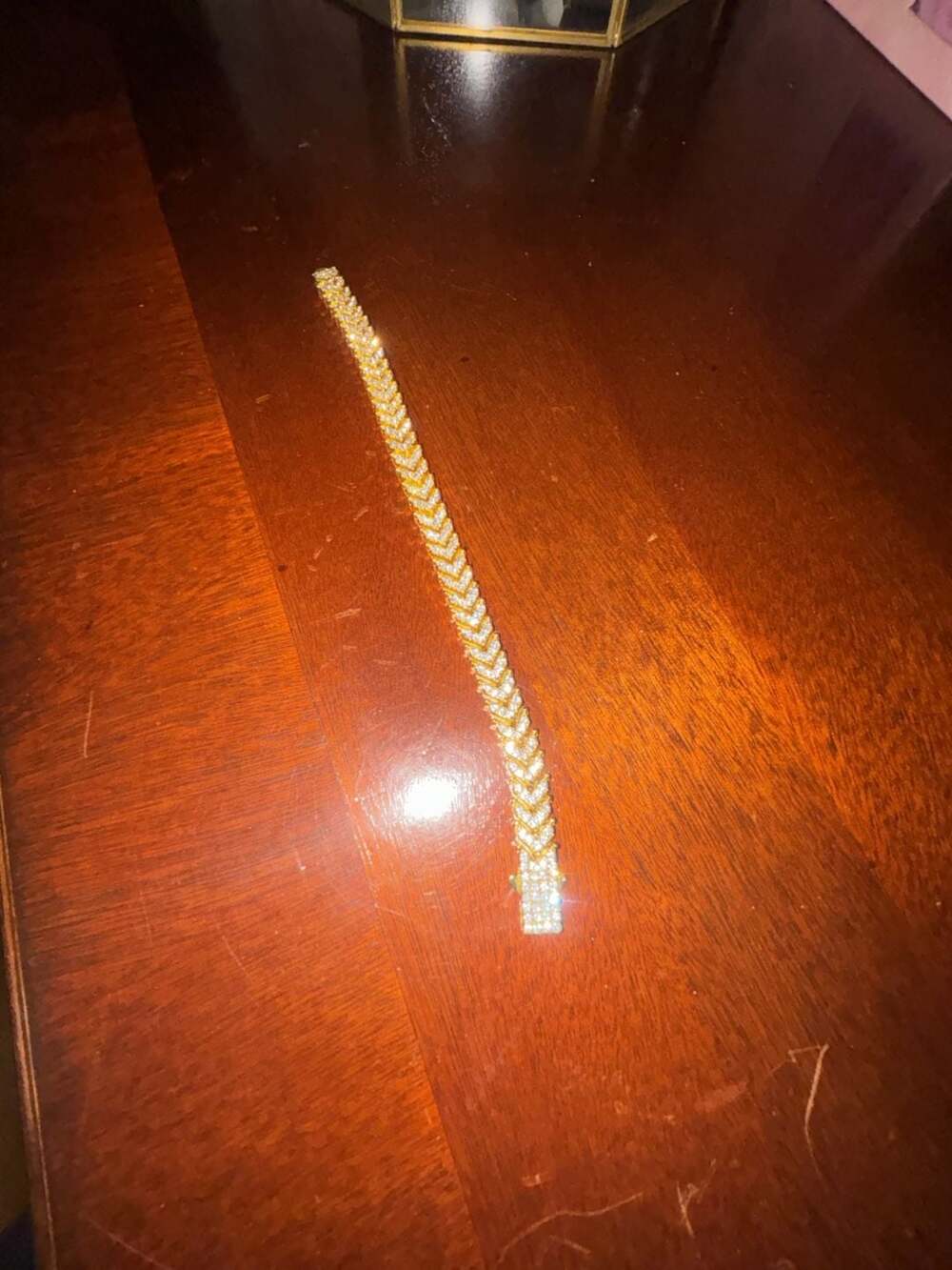 Iced Out Gold Tone Fish Tail Chevron Link Tennis Bracelet with Cubic Zirconia